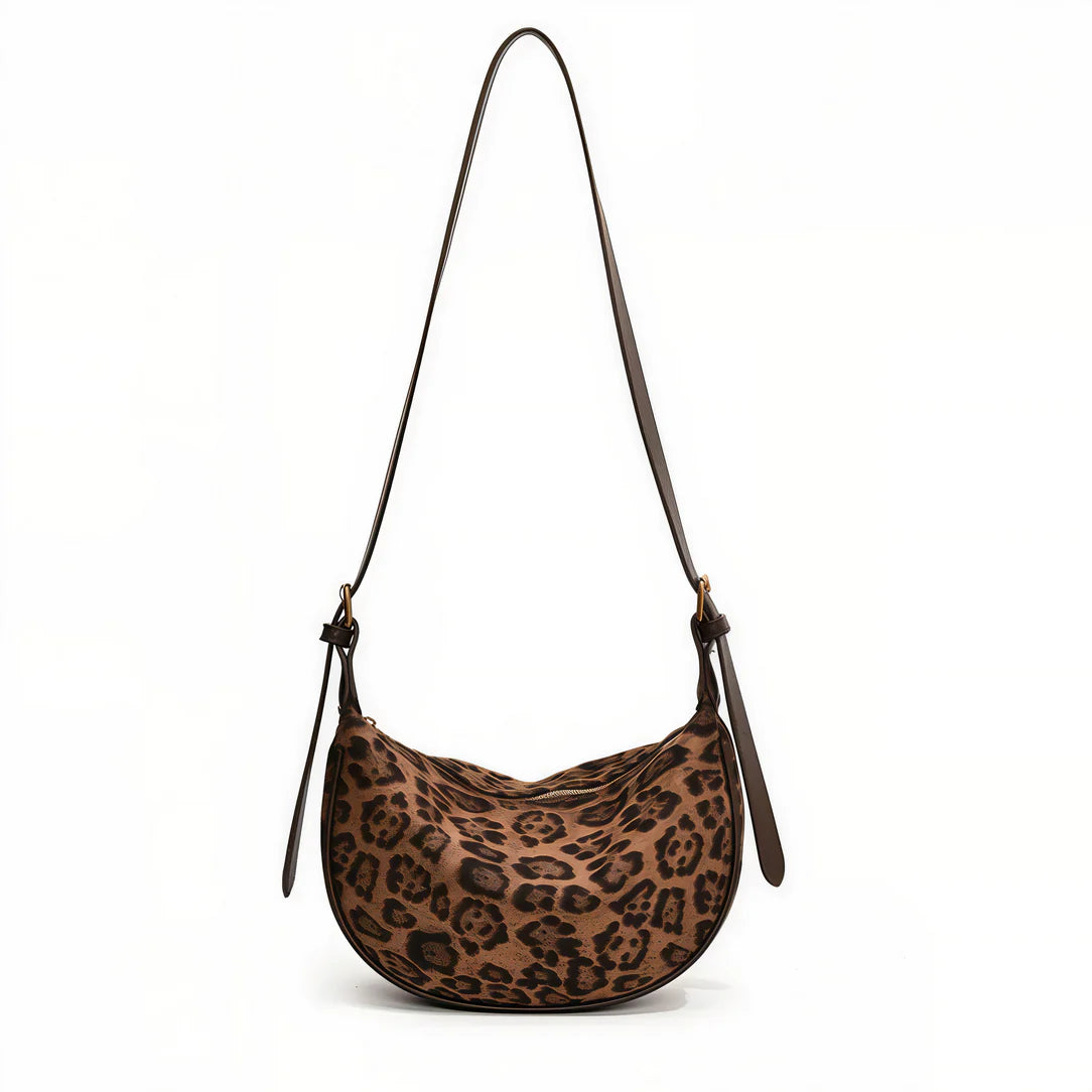 Sac à bandoulière léopard élégant avec format compact et bandoulière léopard