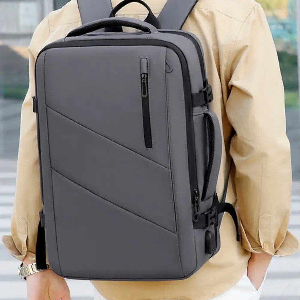 Sac à dos 30l cabine avion Nomad Lite gris avec fermeture éclair, parfait pour voyager