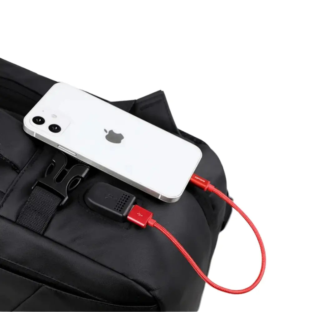 Chargement smartphone depuis un sac à dos 30l cabine avion Nomad Lite