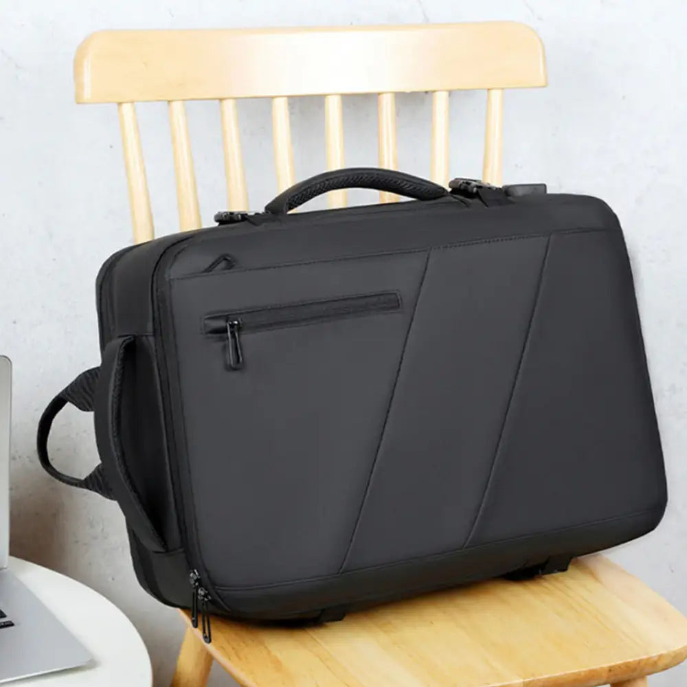 Sac à dos 30l cabine avion Nomad Lite avec une mallette noire rectangulaire convertible