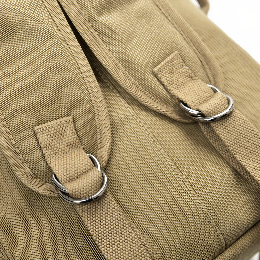 Sangles de sac à dos de voyage vintage en canvas kaki pour un style rétro affirmé