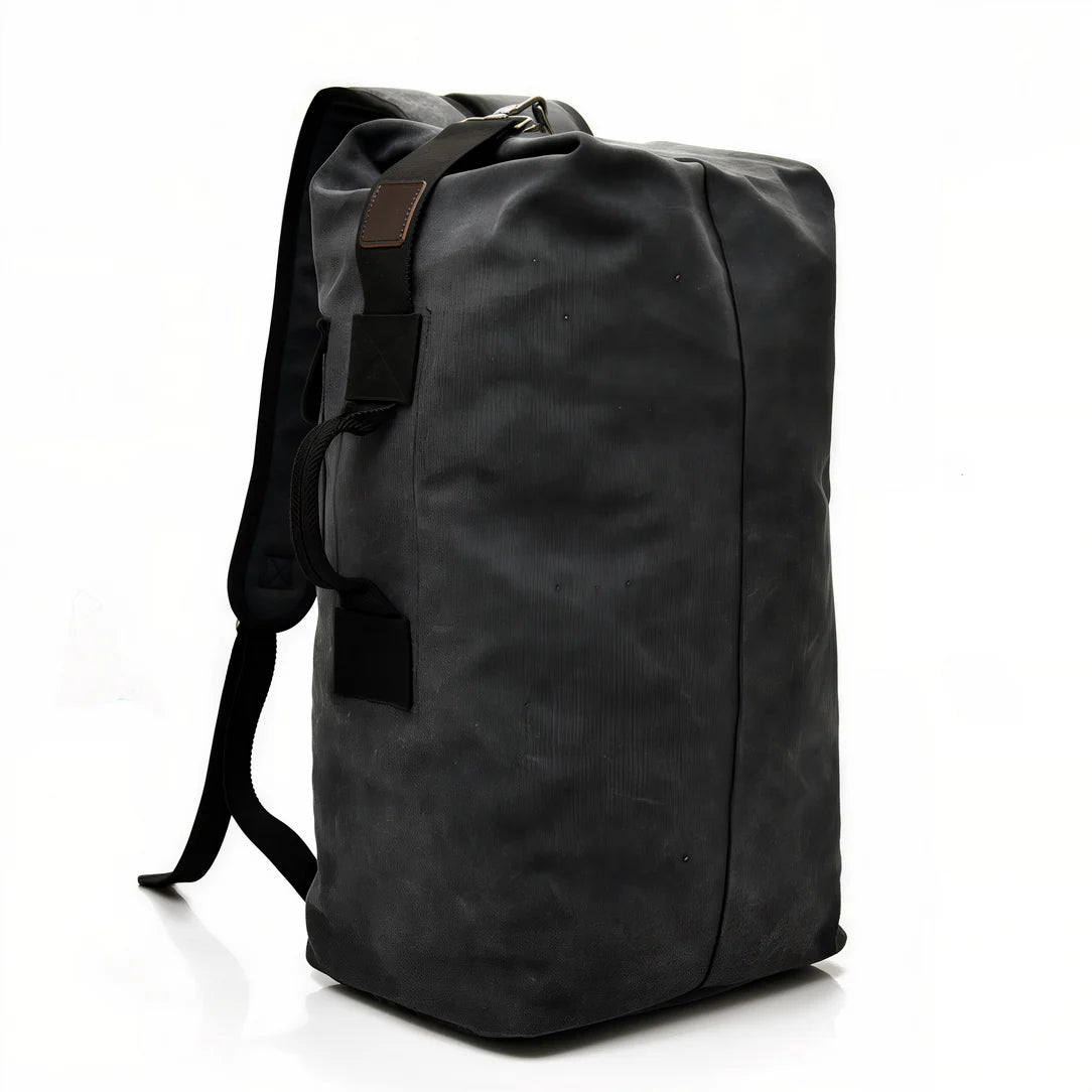 Sac à dos de voyage vintage en cuir noir, rétro affirmé et idéal pour l’aventure