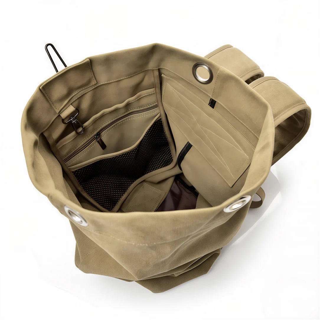 Sac à dos de voyage vintage khaki avec intérieur à poches, style rétro affirmé