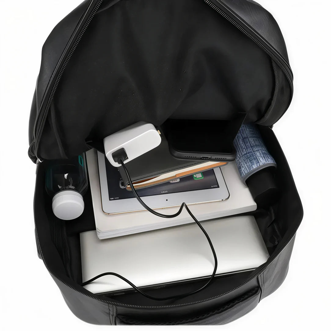 Sac à dos en cuir Kavren avec port usb, rempli d’équipements électroniques