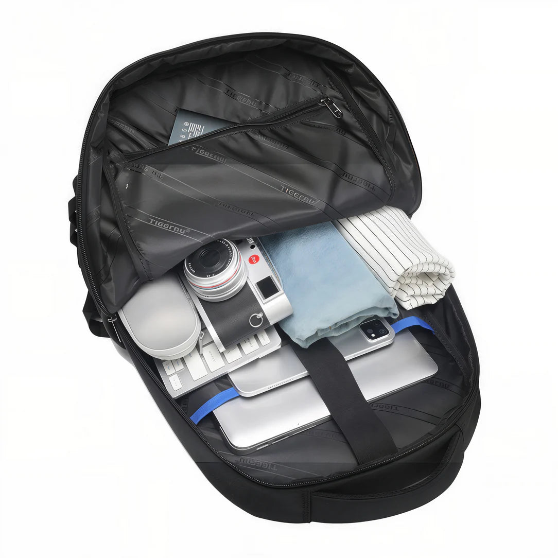 Sac à dos multi compartiment femme Partiva X avec nombreuses poches et contenu ouvert