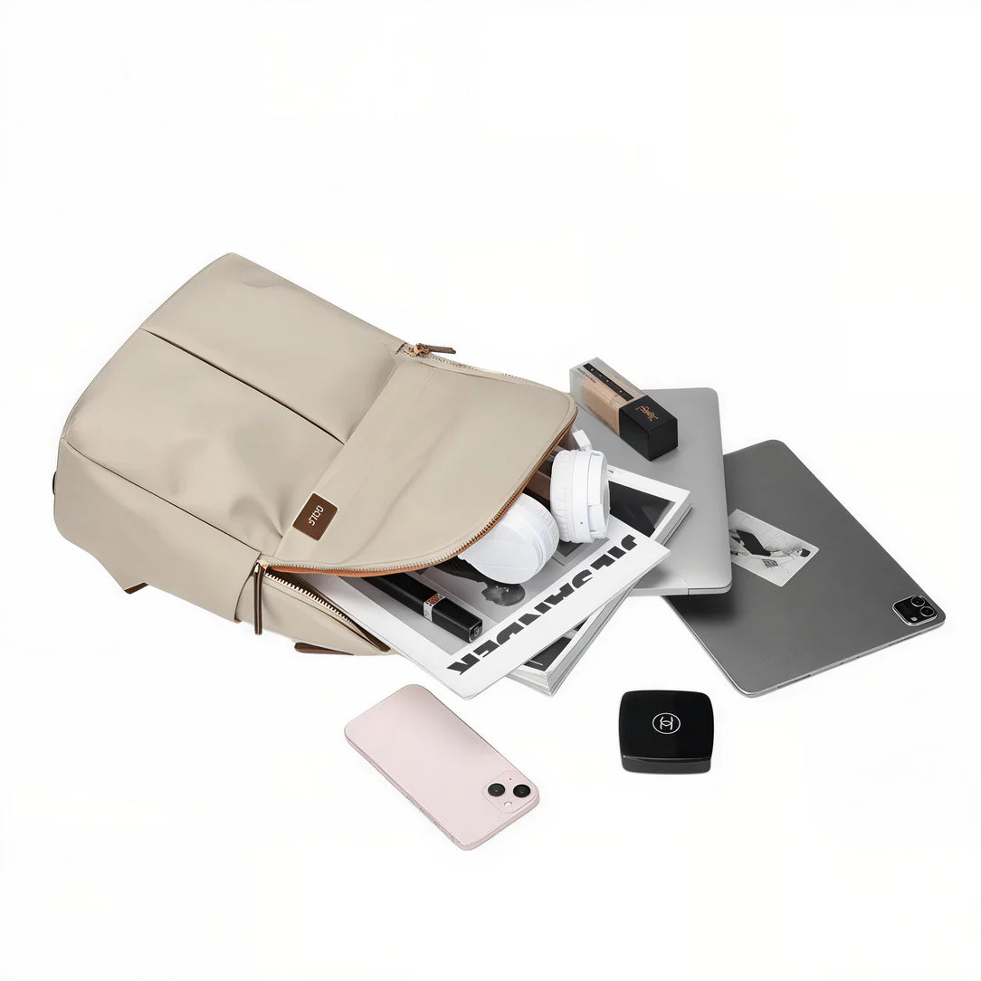 Sac à dos ordinateur 16 pouces femme Nexline 16 beige ouvert avec contenu qui déborde
