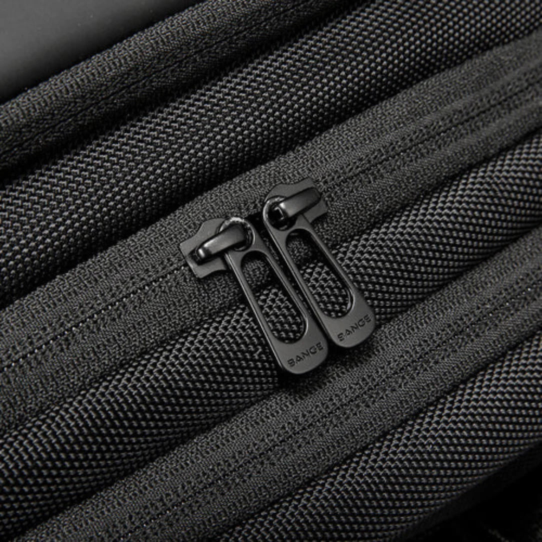 Tirettes de fermeture éclair texturées noires.