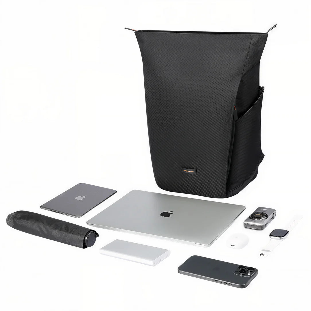 Sac à dos ordinateur homme tendance ouvert avec accessoires tech modernes