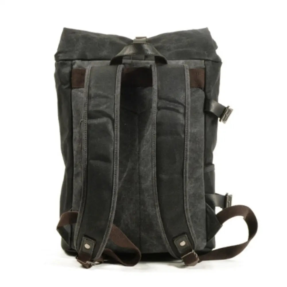 Sac à dos rétro vintage en toile cirée foncée, parfait pour un style durable