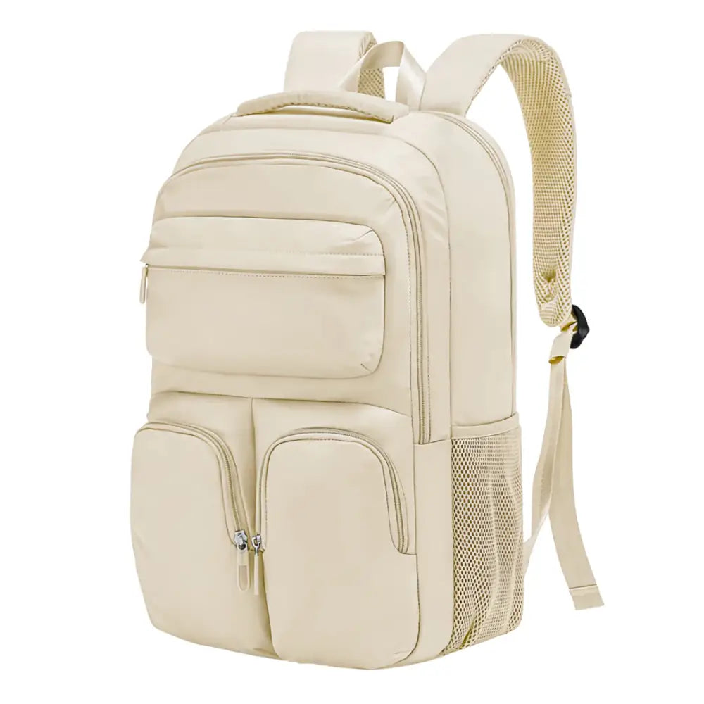 Sac à dos de couleur crème avec de multiples poches.