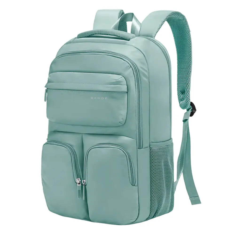 Sac à dos vert menthe avec plusieurs poches.