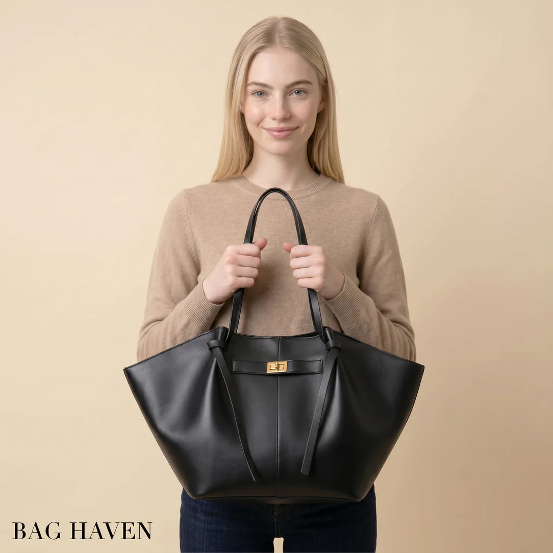 Sac à main de cours grande capacité en cuir noir avec design structuré et détails en métal doré sac à main ines