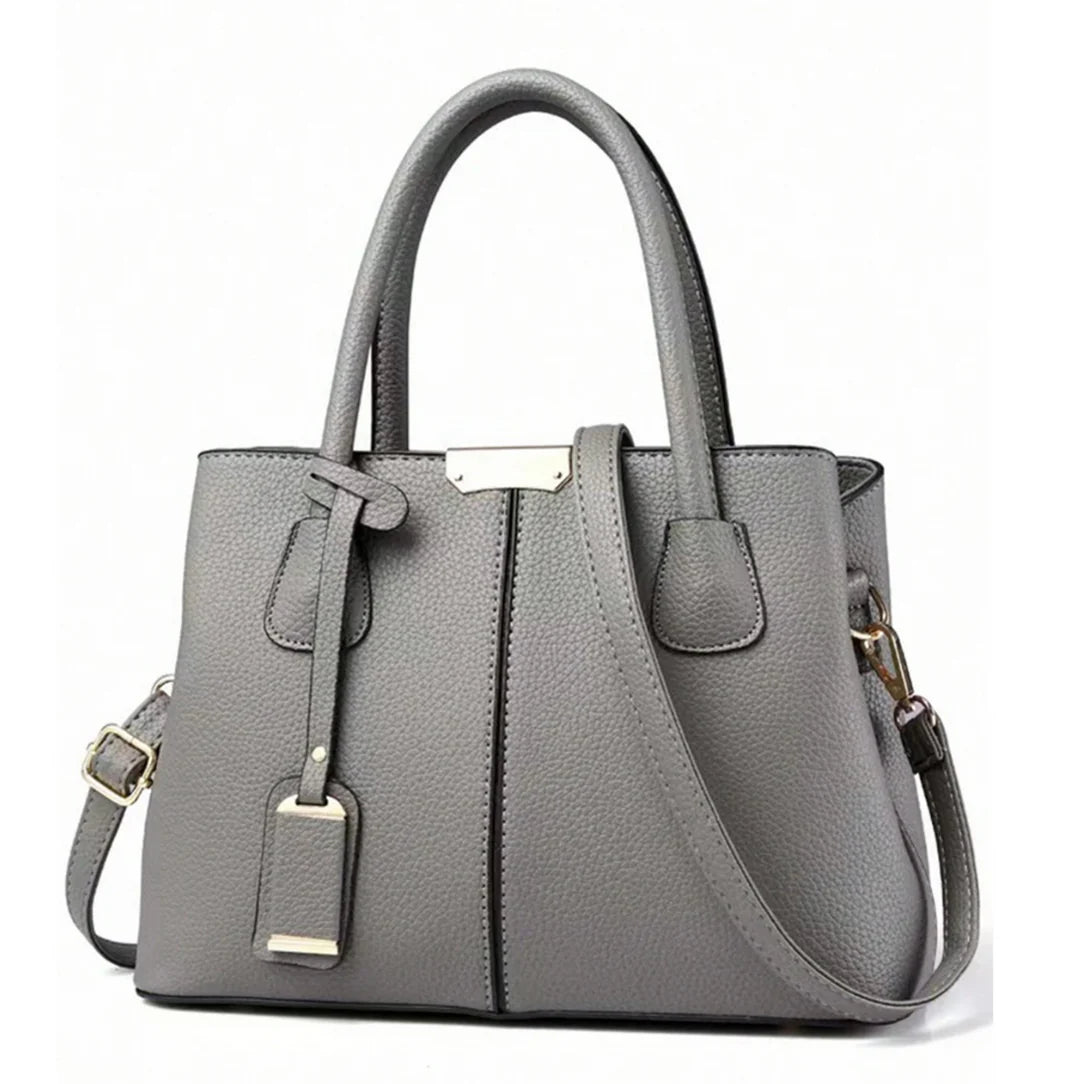 Sac à main minimaliste en effet cuir gris faux-leather pour un look élégant