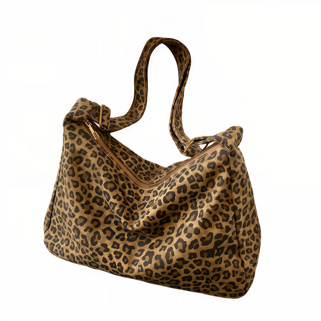 Sac bandoulière femme en tissu façon peau léopard pour un style tendance et chic