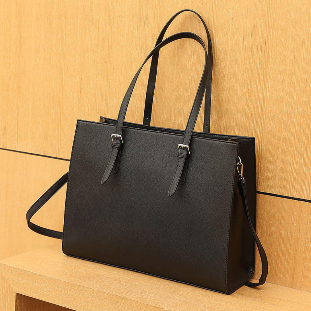 Sac de cour noir Tessium en cuir noir, élégant et pratique pour toutes occasions