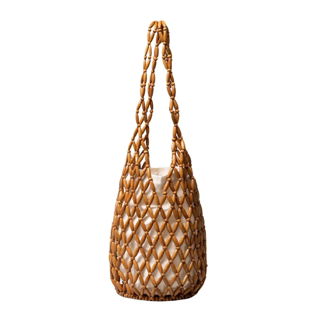 Sac de plage Cala avec design aéré, style naturel et doublure en tissu pour journées d’été