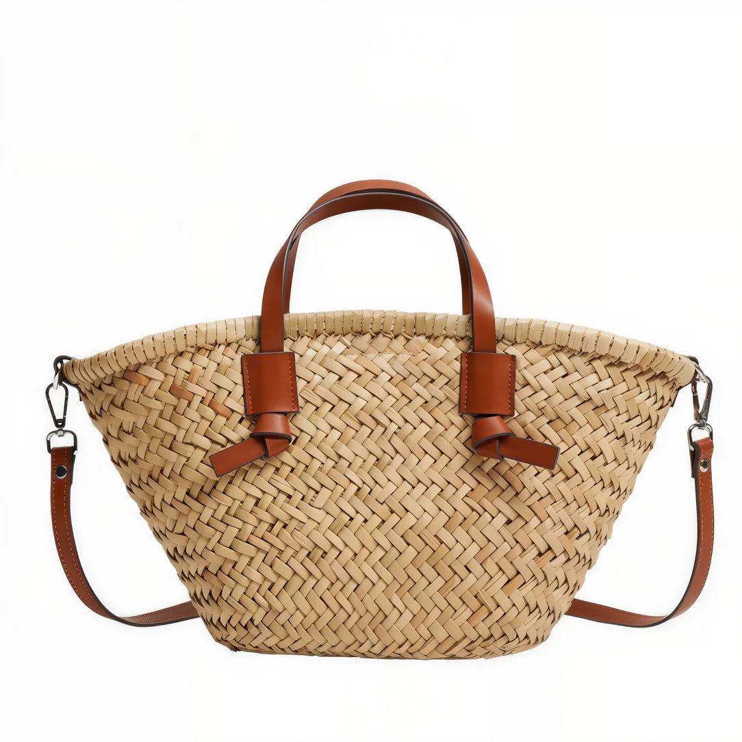Sac de plage en paille Dunéa avec poignée en cuir, idéal pour journées ensoleillées et balades estivales