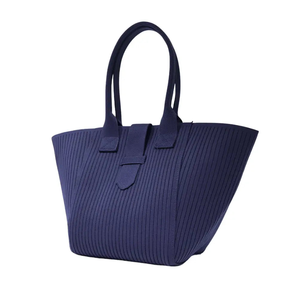 Sac de plage en tissu Brisa avec Navy blue ribbed tote bag et crème solaire