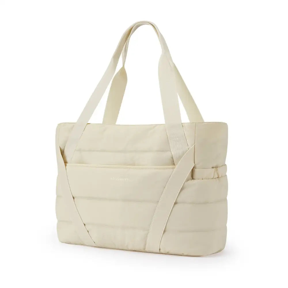 Sac fourre tout multifonction Carmin en crême rembourrée pour un style pratique et élégant