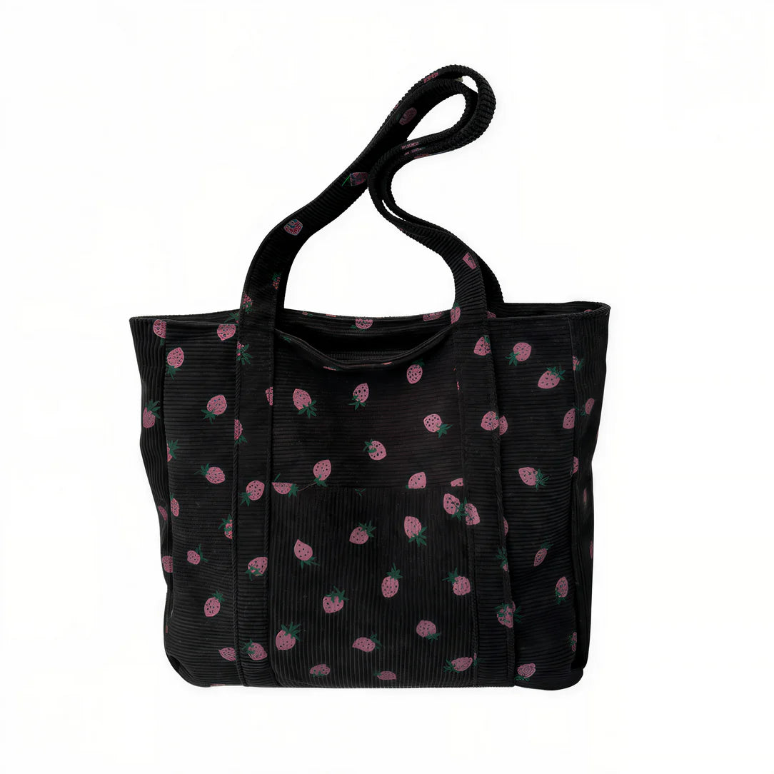 Sac fraise en velours côtelé noir avec motif fraises roses pour un look tendance